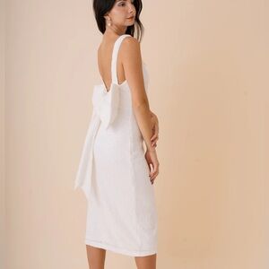 White sequin midi dress with detachable bow on back